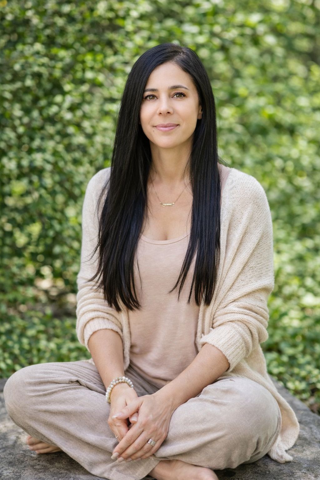 A black and white image of the logo for the knitting centre.